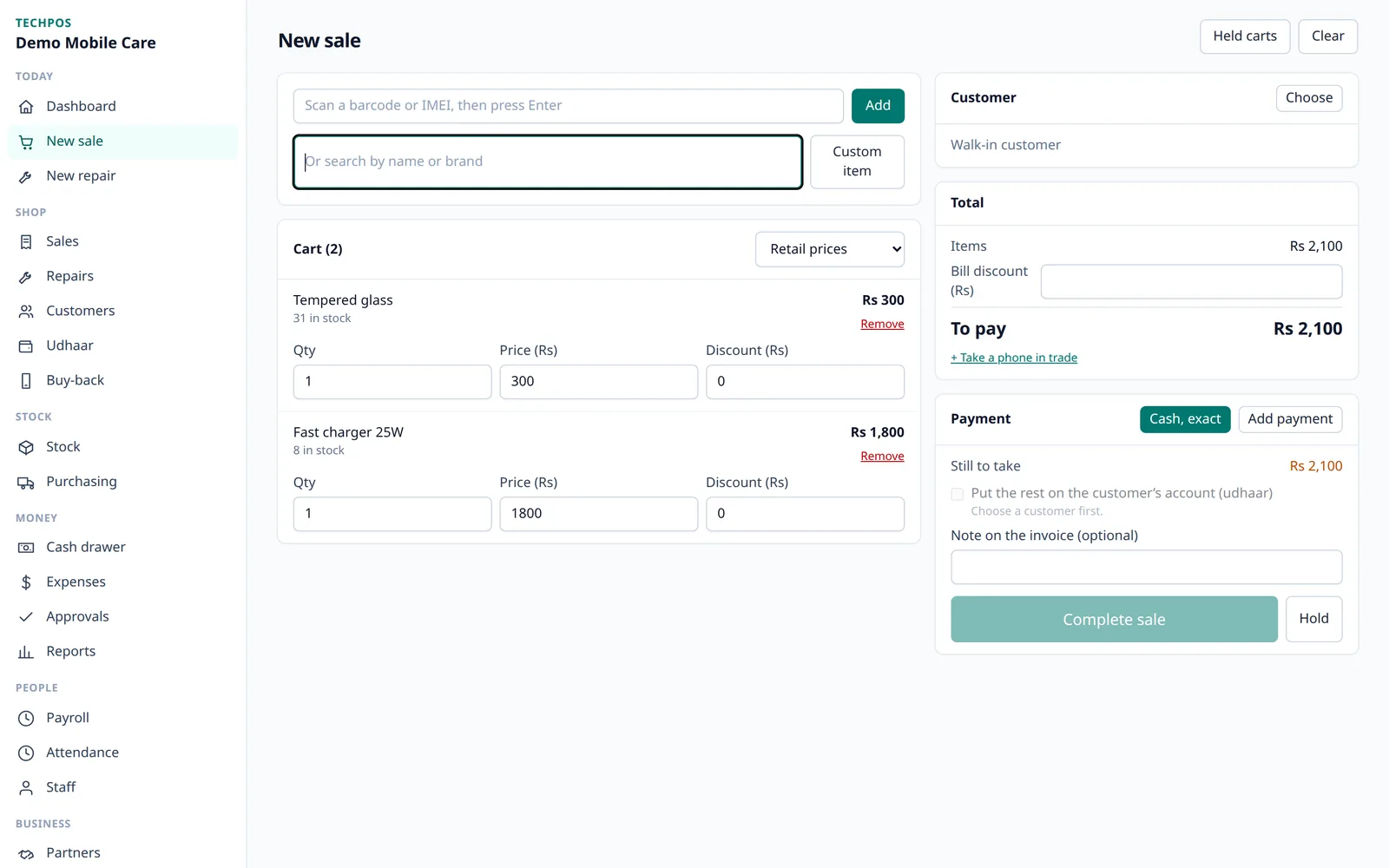 The point of sale with two items in the cart, the amount to pay, and the payment panel.